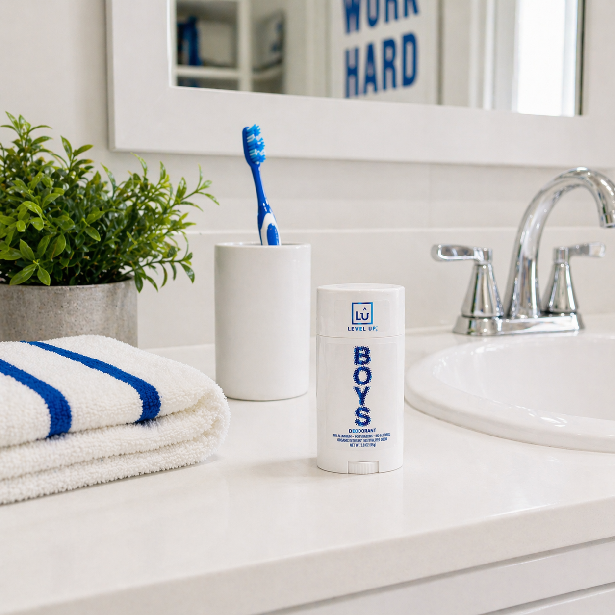 Level Up deodorant on bathroom counter next to sink and toothbrush.